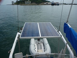 Click image for larger version

Name:	2 solar  panels mounted on stern                               with dinghy below.JPG
Views:	315
Size:	216.7 KB
ID:	180159