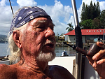 Don Yuen taking a moment on the Aʻu Leʻa in Suisan Harbor.