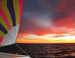 Sunrise during a spinnaker run north