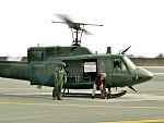 Putting Aleutia on a down-stay below the rotating blades of a running USAF helicopter during training for search & rescue