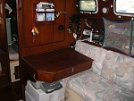 CabinPort Looking Aft 
The custom Nav Table folds up for sleeping.