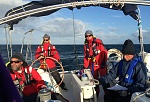 2014 Newport/Ensenada race in the morning after the storm. 
With Angela, Tom, Ian and Warren. 
Thank you Ian for taking the pic.