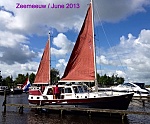 inspecting the main sails