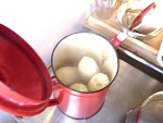 Steaming corn in the coffee pot.