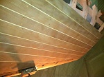 IMG 0419 detail of planking process.  The light lines in between the planks (sepele) are clear cedar splines fitted and glued. Hull will be sealed...