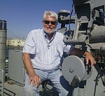 Me siting on an troop ship gun