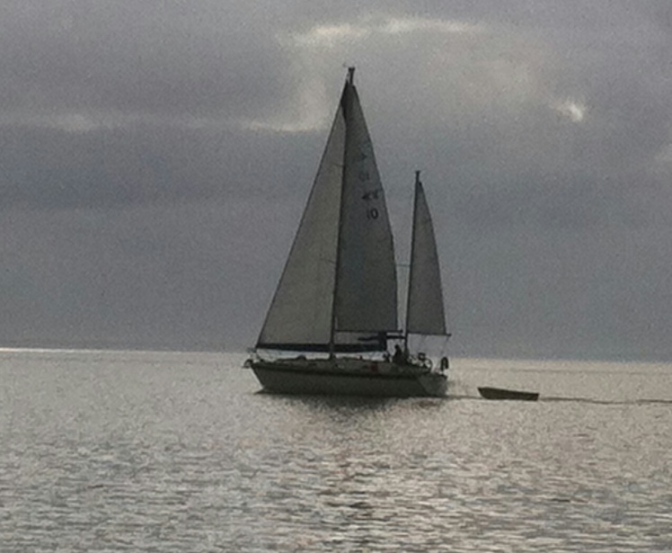 Under Sail. First time single handing with all three sails.  A squall came through to make it more exciting. Part of the ICW.