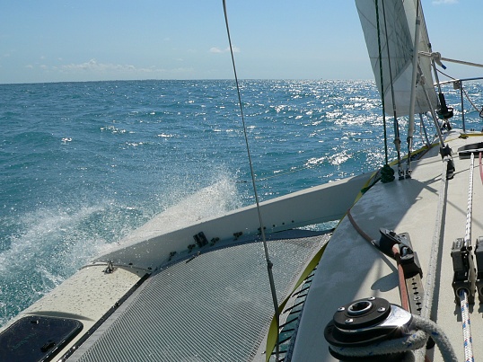 Trimaran Sailing Man-O War Key, close hauled making 11 knots.....