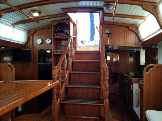 Gryphon salon stairs to companionway and galley.