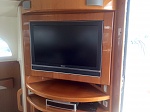 Built in saloon entertainment center with Bose 321 sound system and 32" LG 3D LED TV.