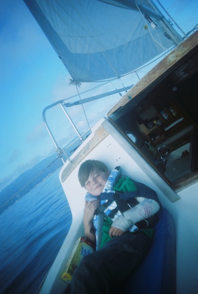 Son on a hazy windless day off Pillar Point