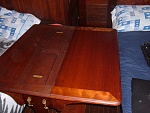 Mohogany wing table on board Petrel