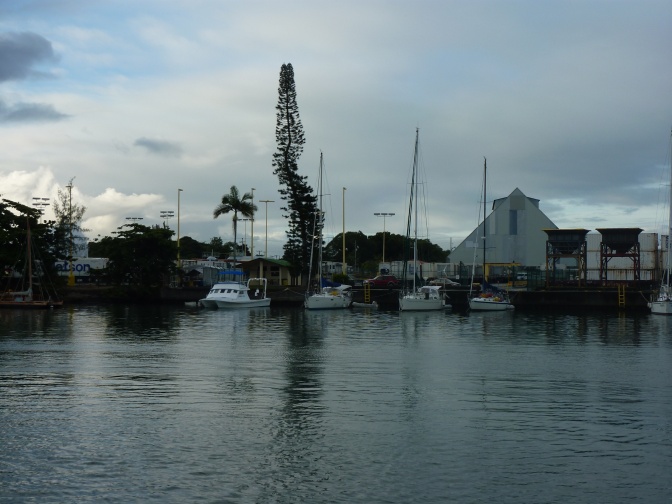 Radio Bay's tiny anchorage and dock at Hilo.  About 9 max boats can tie up stern to and 3 more anchor.