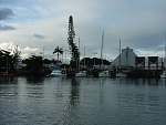 Radio Bay's tiny anchorage and dock at Hilo.  About 9 max boats can tie up stern to and 3 more anchor.