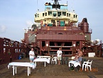 Xmas day in the Red Sea, me in the middle, the big bloke is the cook