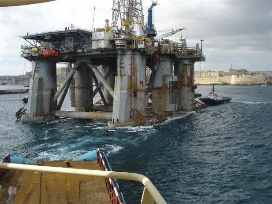 Towing a rig out of Valletta Harbour, Malta