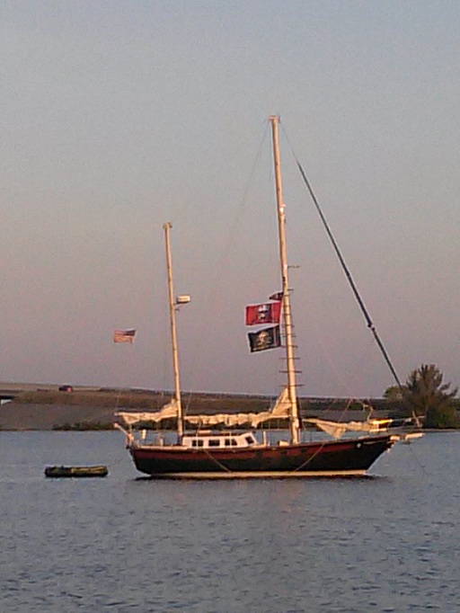 Scallywag anchored in the morning near Melbourne, Florida.