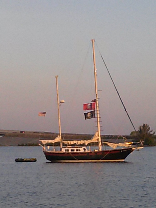 At Anchor. Headsail sheet is in the water... I'm down below sleeping as a neighbor took the photo.