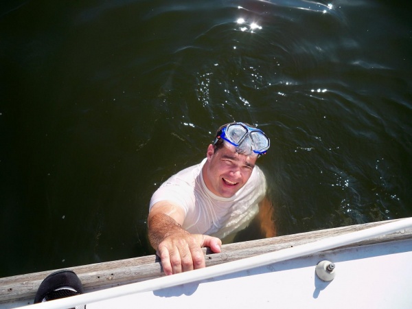 Checking the condition of the cutlass bearing and shaft.