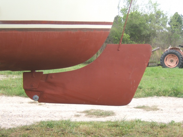 22p. 2012, RR 23 redesigned rudder. Added 4" to aft end. Much more responsive. Note raised rudder fits curve of hull. Nice!