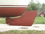 22p. 2012, RR 23 redesigned rudder. Added 4" to aft end. Much more responsive. Note raised rudder fits curve of hull. Nice!