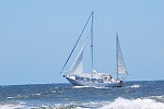 Daedalus #5  From the beach at Orange Beach, Alabama. 
These photos taken by Ben Farrar my Grandson. June, 2012. 
Capt. B.J. Roberts is the helmsman...