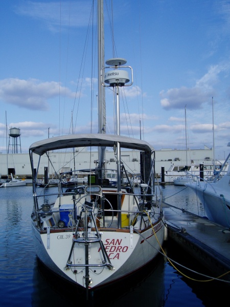 Stern View with Monitor Wind Vane - These pics are before she gets hauled for a new bottom and other things I am going to do to her...  By next spring, she will be perfect...