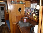 Again, Molly B. The once chart table converted to a half-assed galley by the previous owner, a clueless tweaker looking to build him a "stabbin...
