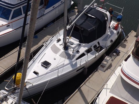 Photo of Take Two taken from My Girls mast top.  The white line from Take Two's electric winch was used to hoist him up her mast on his boat.