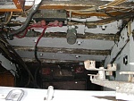 remnants of the fire suppression and wiring in the engine compartment