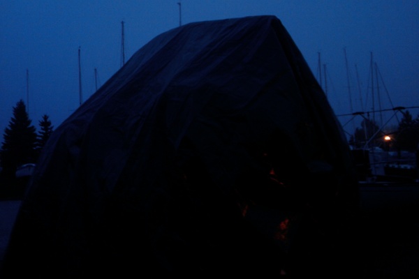 boatribs tarp

It was dark when we got the 900 000 lb tarp on, just 2 of us.  Please let it be wind-free 'til spring, (will we be re-tying it weekly?) - then bring on the sailing weather!