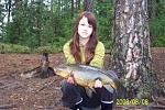 The Catch: My daughter with one of her 1st tenches weighing in at above 3kg. This one 3320 gr/7.3lbs to be exact