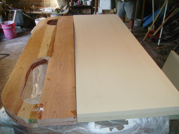 The beginning.  The leading edge (the "crush zone") is redwood, dried and straight grain, 2 pieces of 1 1/2" X 11 1/2" X 7'.  The solid section is the main load bearing element, same dimensions.  The after 2/3 is two pieces of 1 1/2" 4# polyurethane foam, all pieces glued with WEST System epoxy.