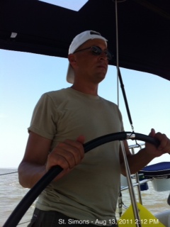 me at the helm of a catalina 355