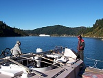 wishing we were on that ship- leaving picton heading for tory passage, cook strait & the north island- under outboard...