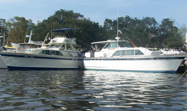 Our Wet & Wild (left) docked by our last Chris Craft (1964 46" Connie) now owned by Jim and Patsy Snell.  We were together in Madisonville, LA (Oct '13) for the Wooden & Classic Boat Show.  How cool!