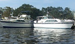 Our Wet & Wild (left) docked by our last Chris Craft (1964 46" Connie) now owned by Jim and Patsy Snell.  We were together in Madisonville, LA (Oct...